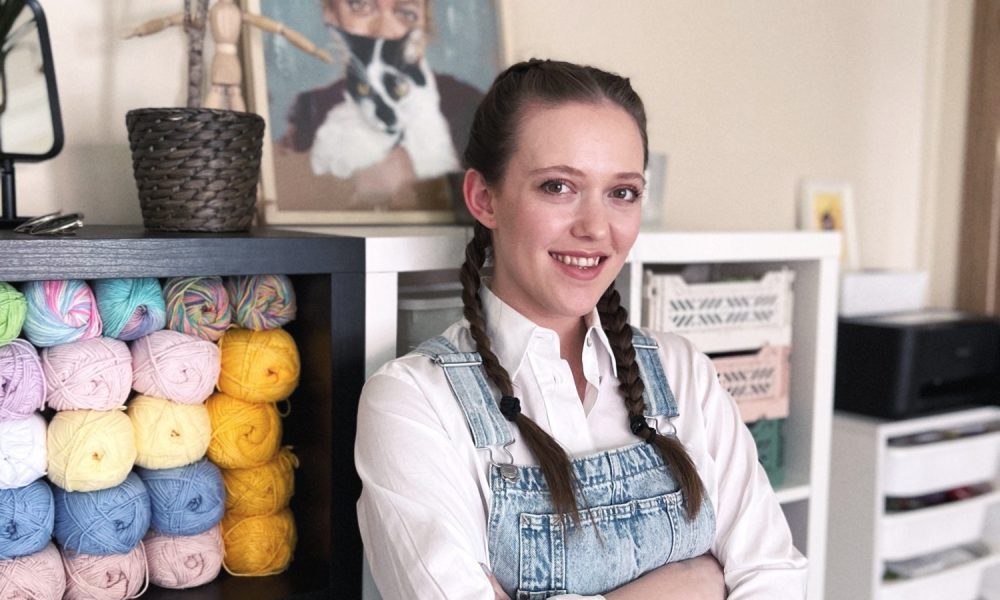 Aycan, the maker behind EmbroiderywithAycan, in her studio